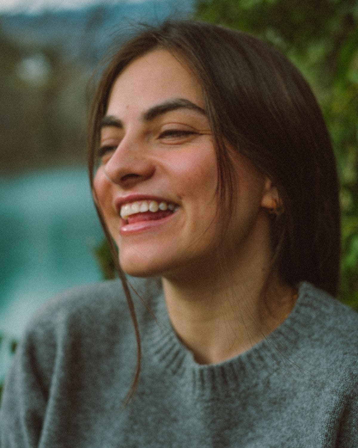 A smile that reads as yours, not as work