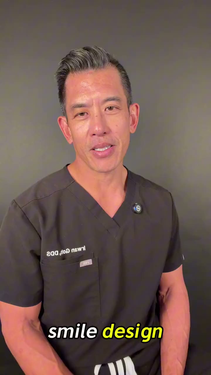 Dr. Irwan Goh in his Henderson practice, explaining how he designs a smile from the face